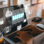 The laptop uploads files to cloud storage